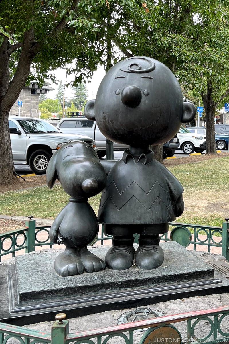 statue of Snoopy and Charlie Brown