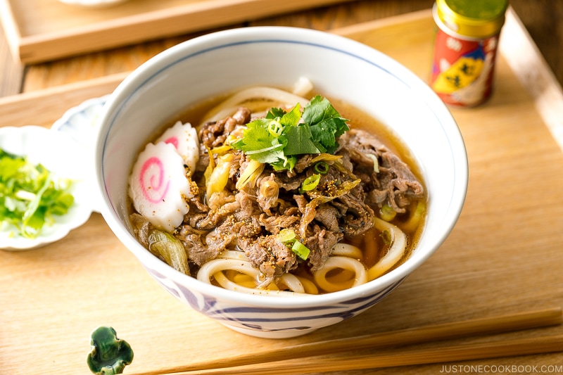 Beef udon noodle soup in a donburi bowl.