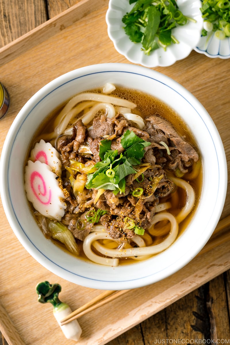 Beef udon noodle soup in a donburi bowl.