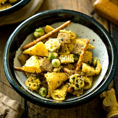 A ceramic bowl containing homemade Furikake Chex Mix.