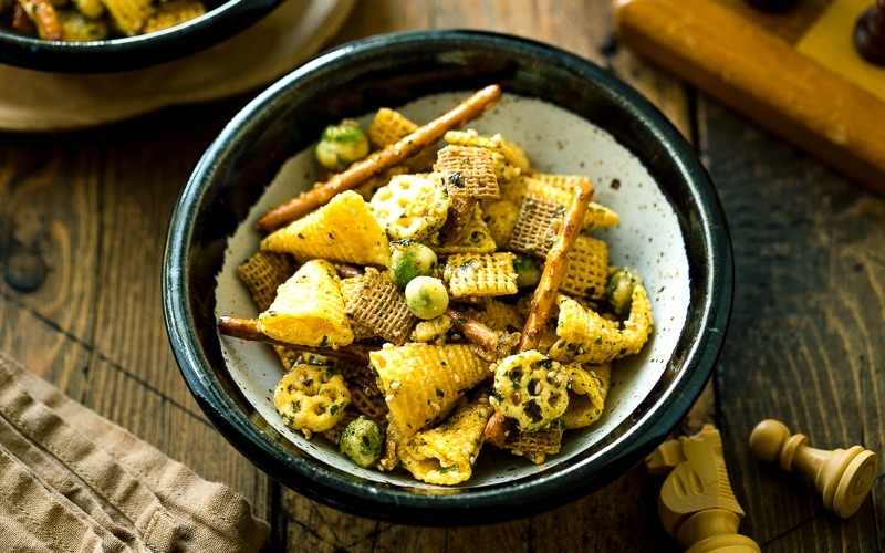 A ceramic bowl containing homemade Furikake Chex Mix.
