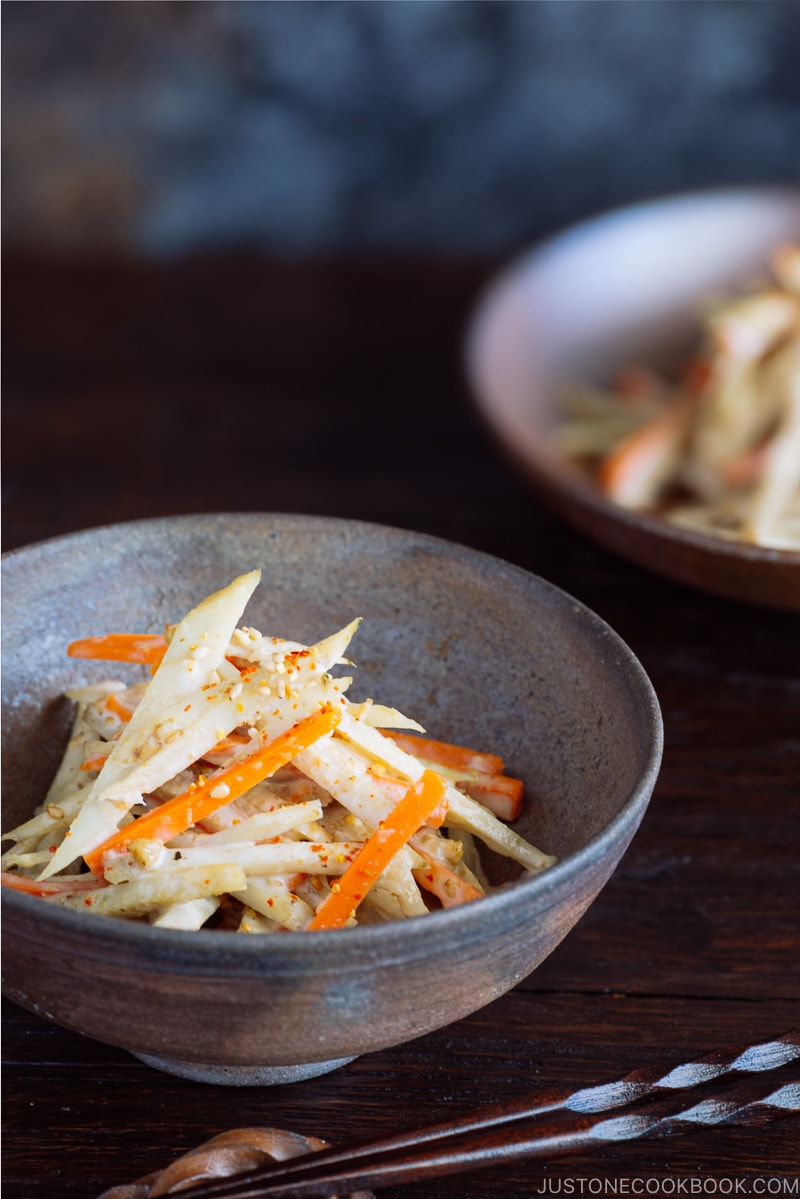 A Japanese bizen ware bowl containing Gobo Salad (Japanese Burdock Root Salad).