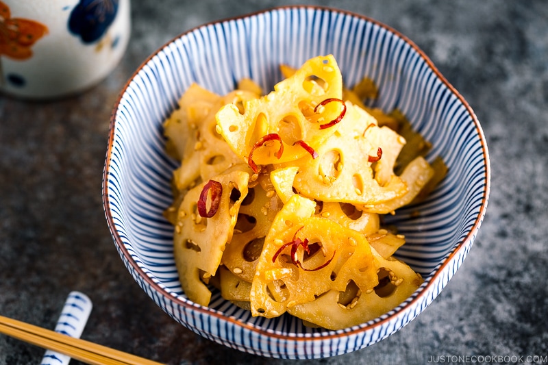 A blue and white bowl containing Kinpira Renkon (Lotus Root).