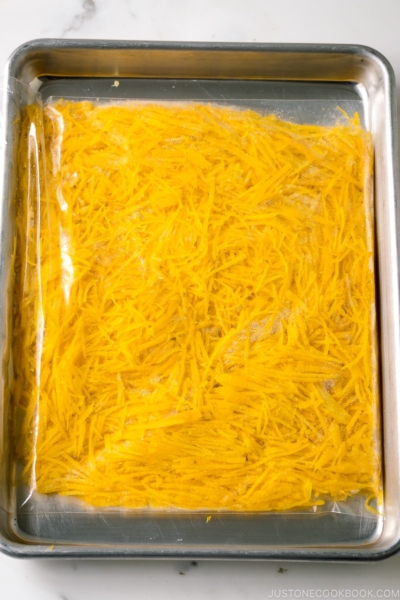 A plastic bag containing yuzu zest.