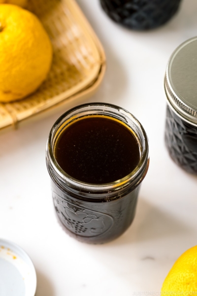 A mason jar containing Yuzu Ponzu (Yuzupon) - Japanese citrus dipping sauce.