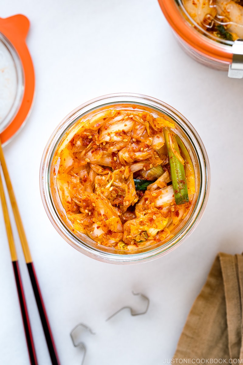 Weck jars containing fresh kimchi.