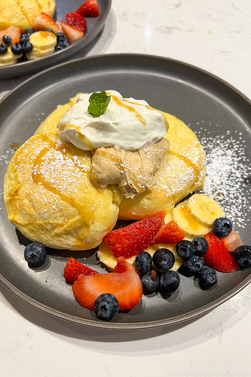 Earl Grey & Sea Salt souffle pancake with fruits on a plate