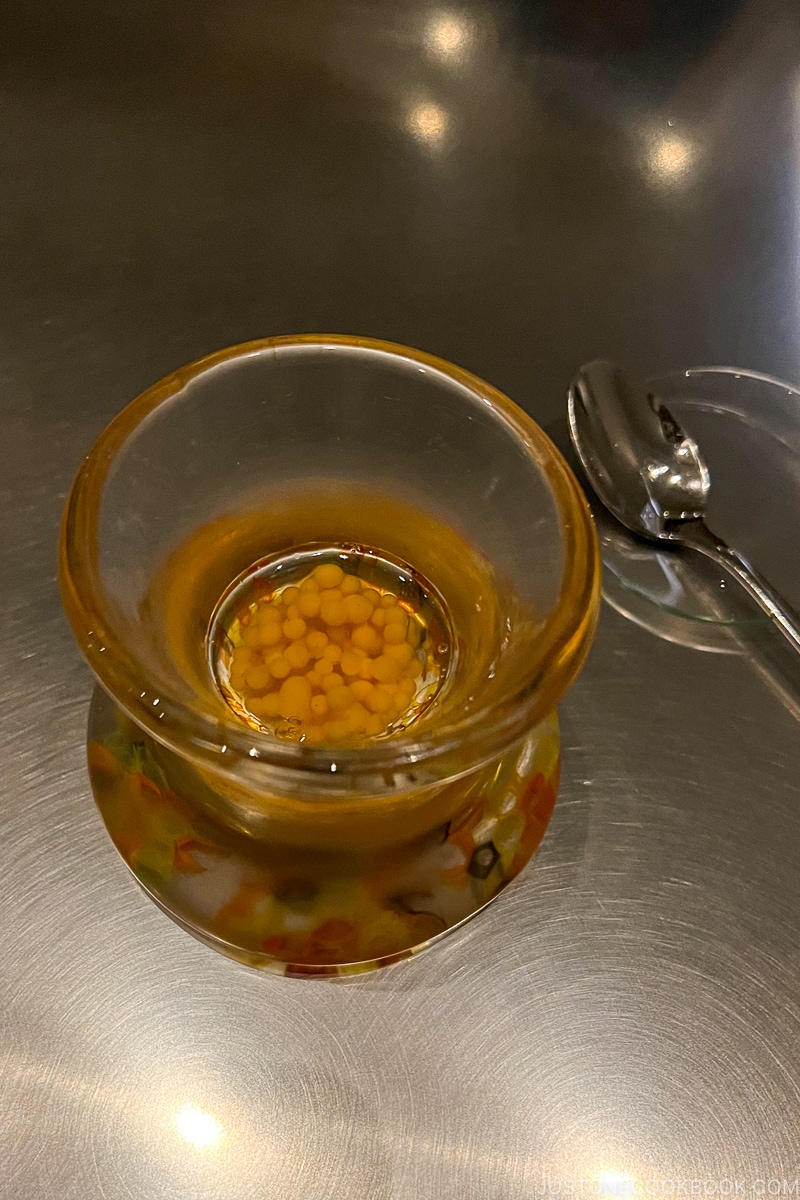 smoked char roe and carrot in a glassware