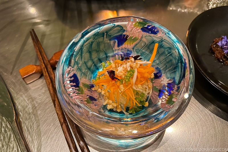 salad on a color glass bowl