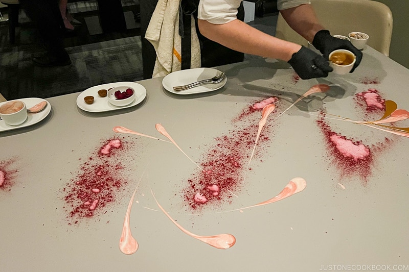 dessert being painted on the table with rose apple, birch, butter pecan, and dark chocolate