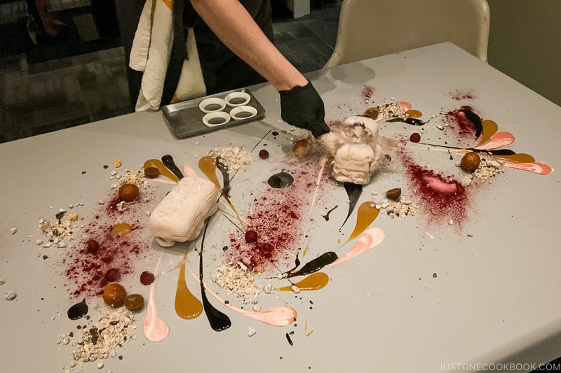 frozen dessert being broken by a spoon