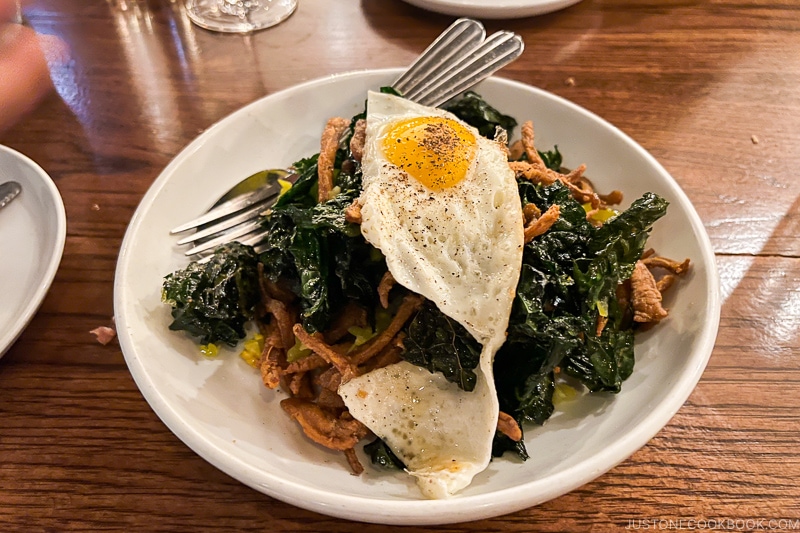 Crispy Pig’s Ear with kale and fried egg