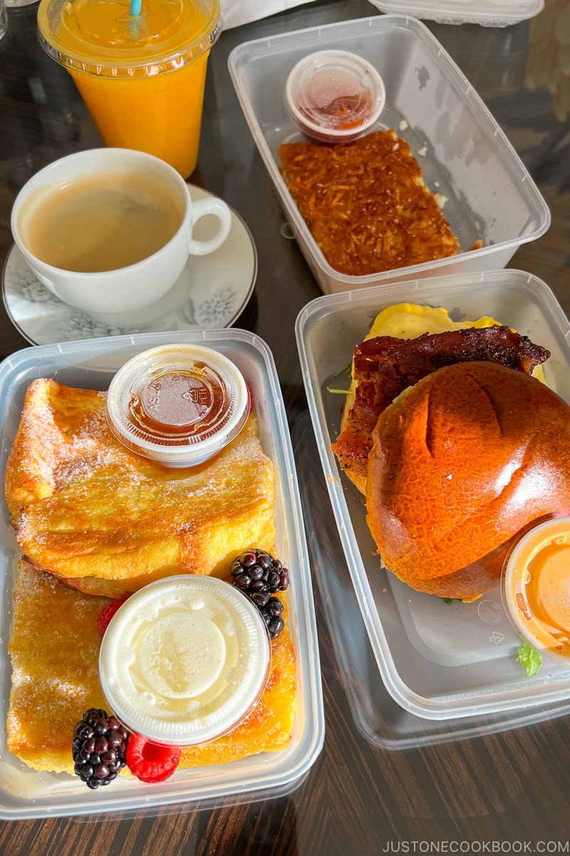 breakfast in plastic containers on a table