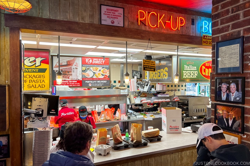 food pick-up counter at Portillo's Hot Dogs