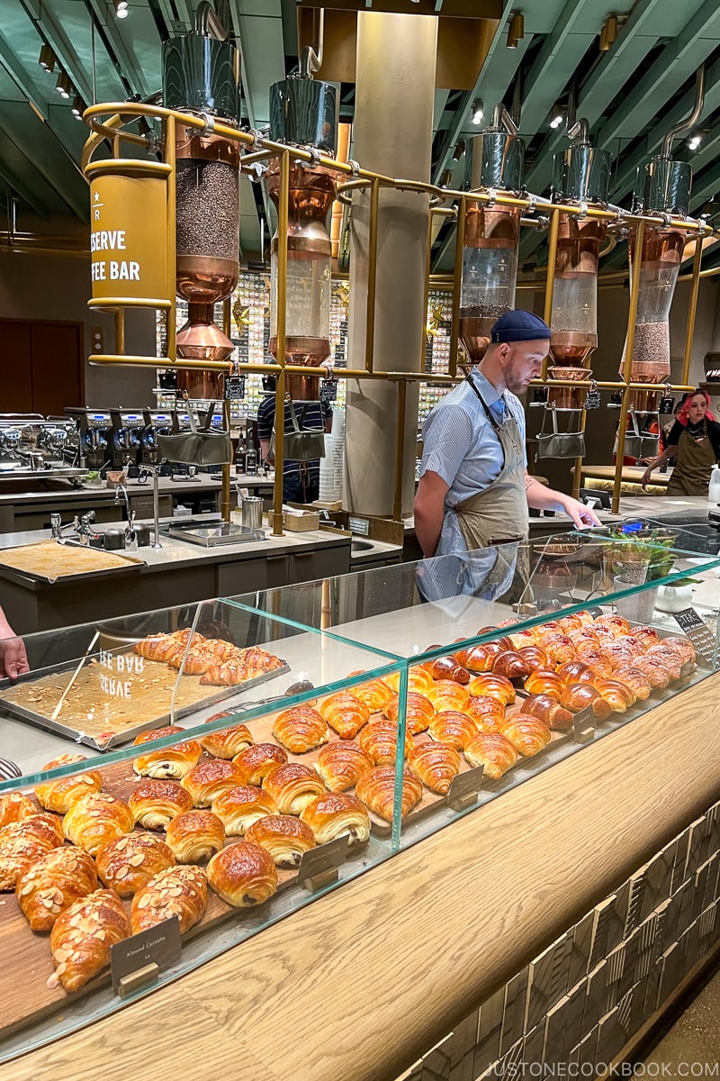 pastries inside a glass case in a coffee shop