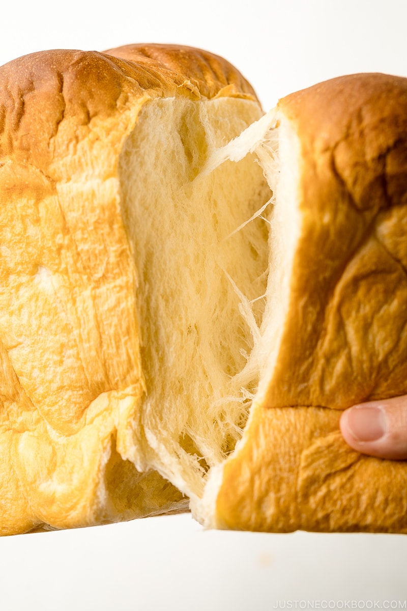 Japanese Milk Bread (Shokupan) torn apart with hands.