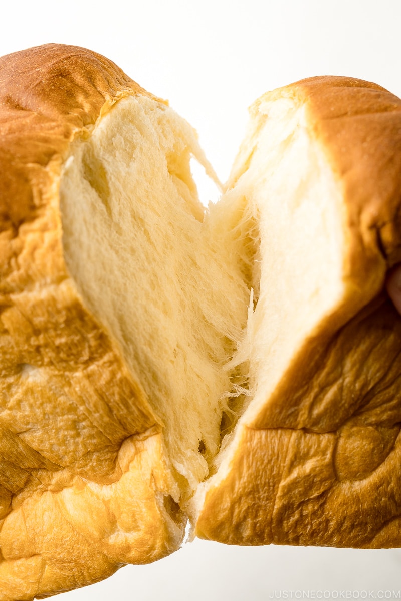 Japanese Milk Bread (Shokupan) torn apart with hands.