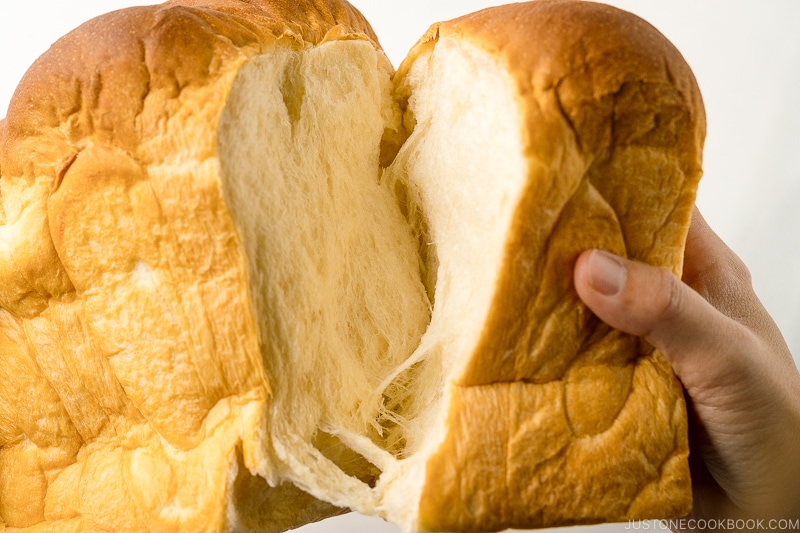 Japanese Milk Bread (Shokupan) torn apart with hands.