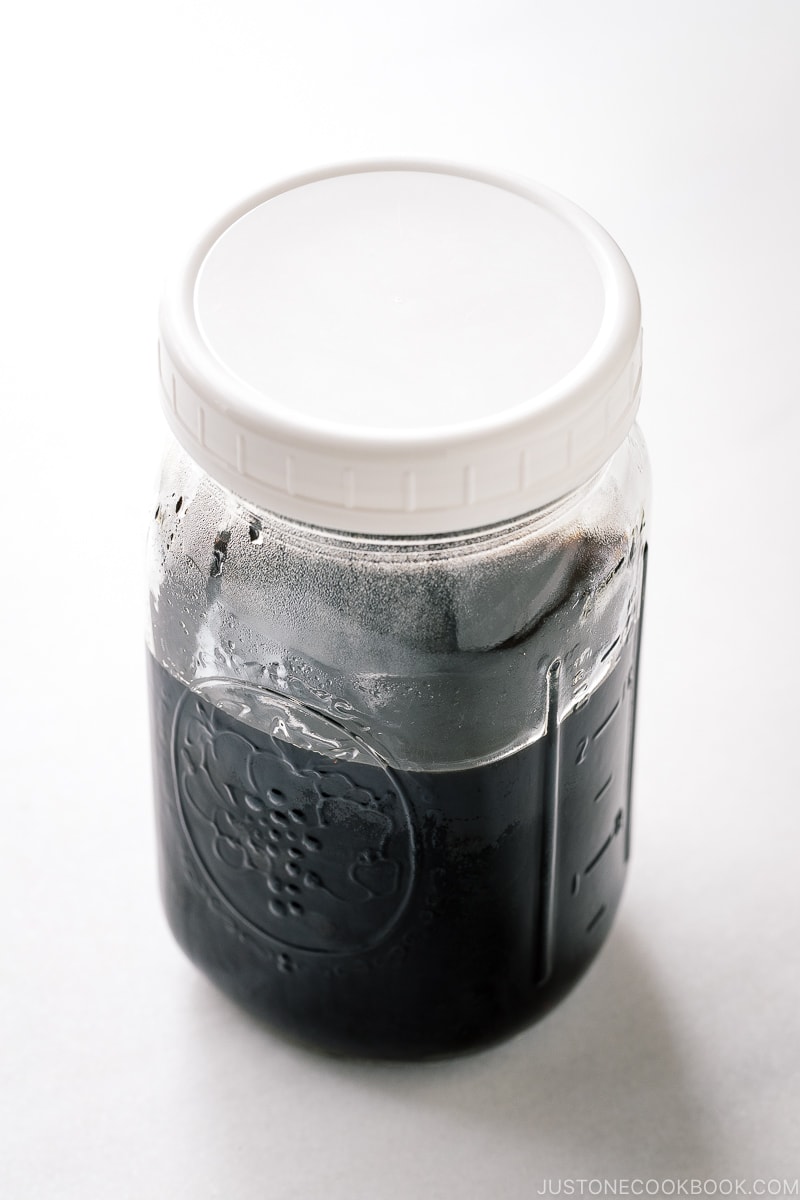 A mason jar containing mentsuyu (Japanese noodle soup base)