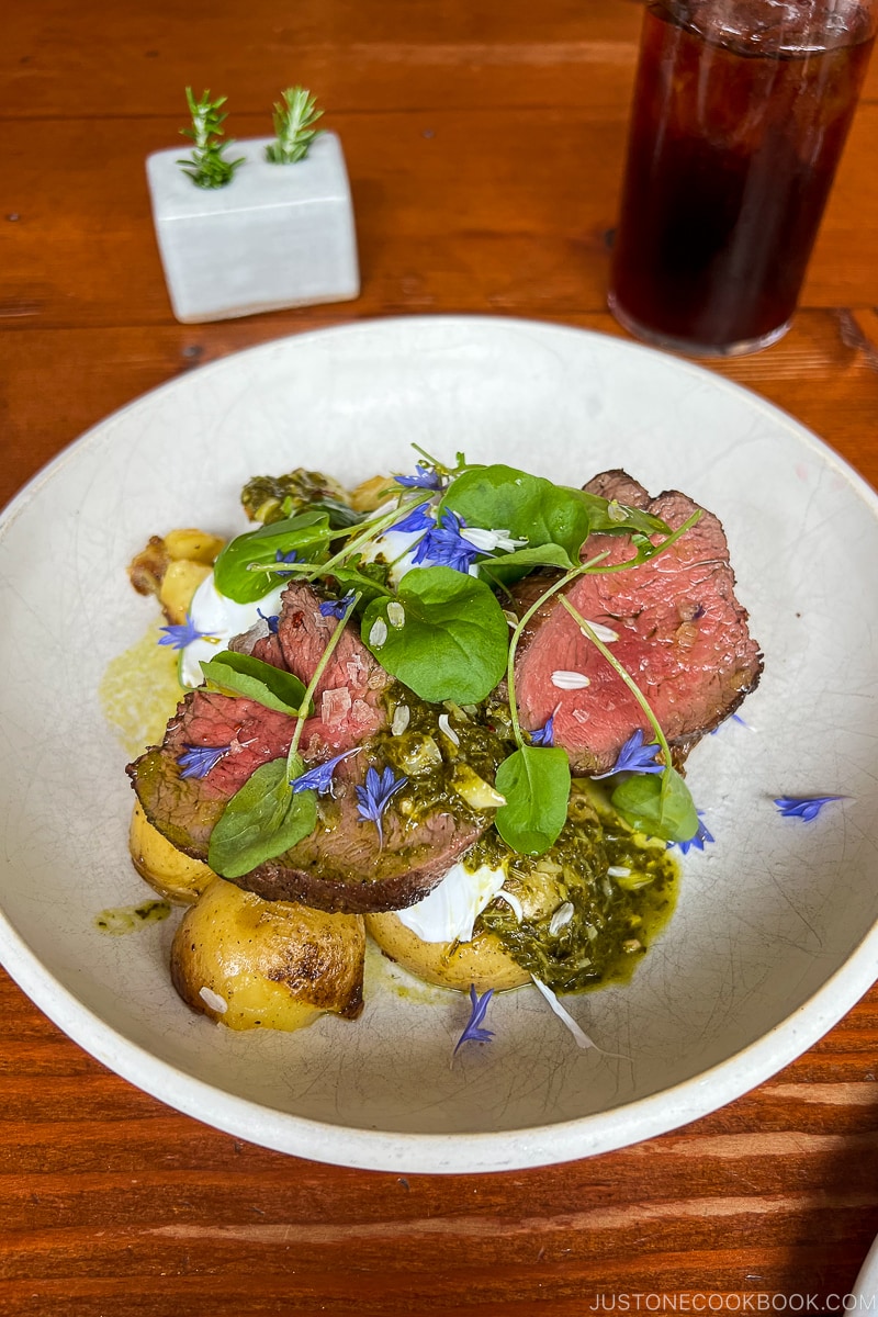 beef tenderloin, poached duck egg, baby potatoes, chimichurri