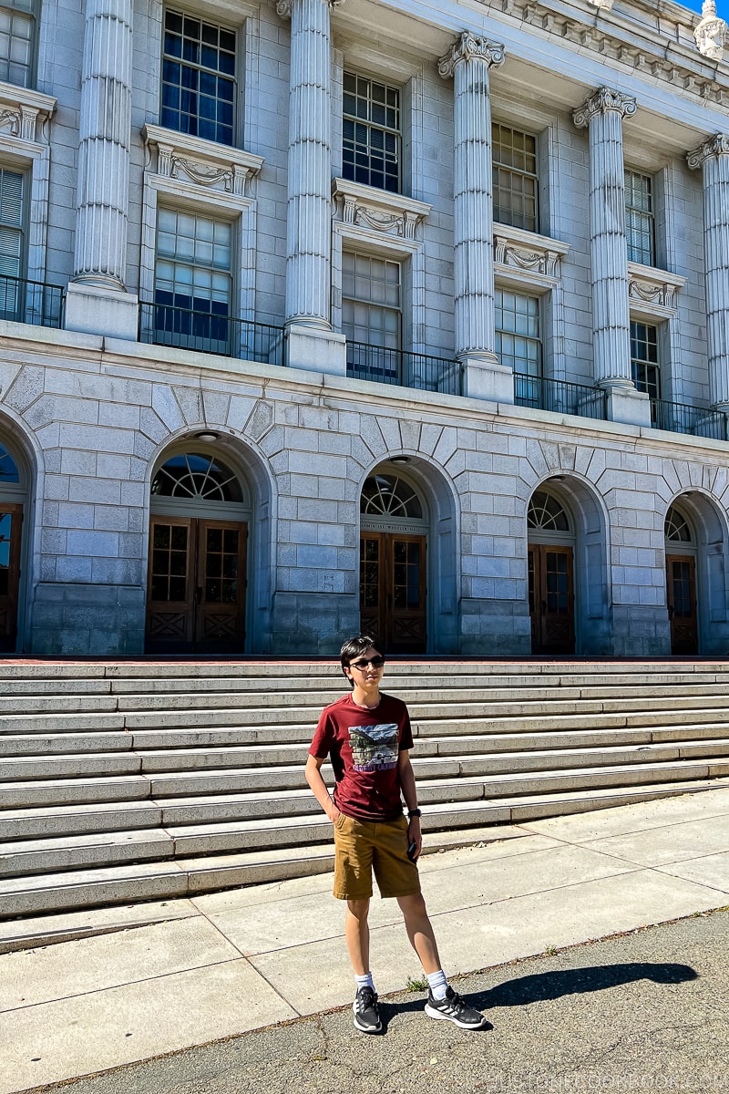 boy in front of Wheeler Hall Auditorium