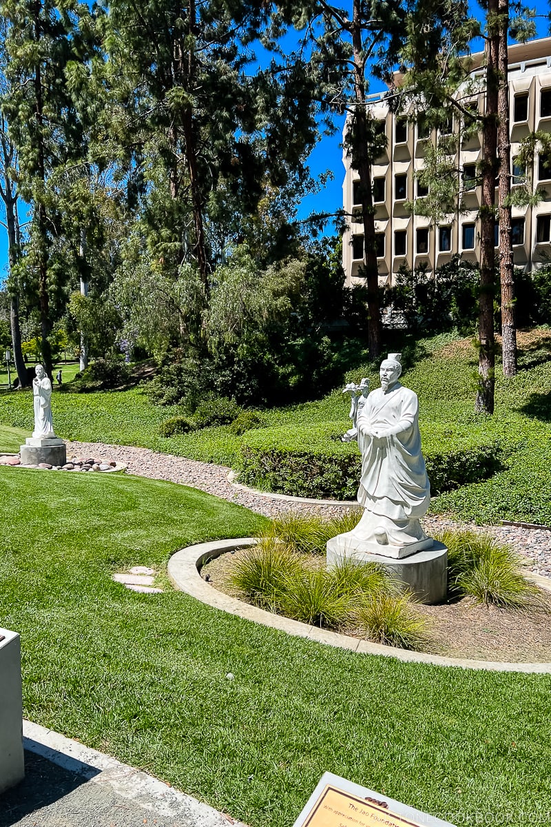 statues of Chinese historical figures in the garden