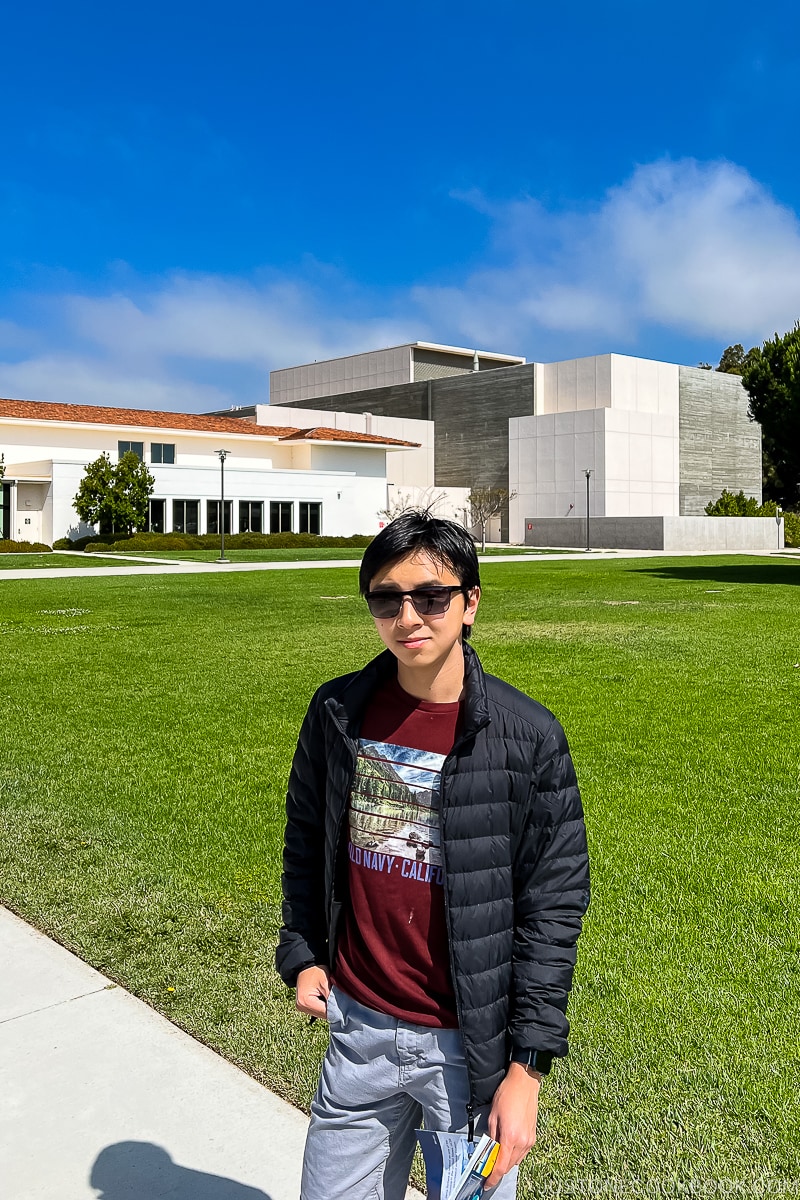 a boy in front of UCSB building