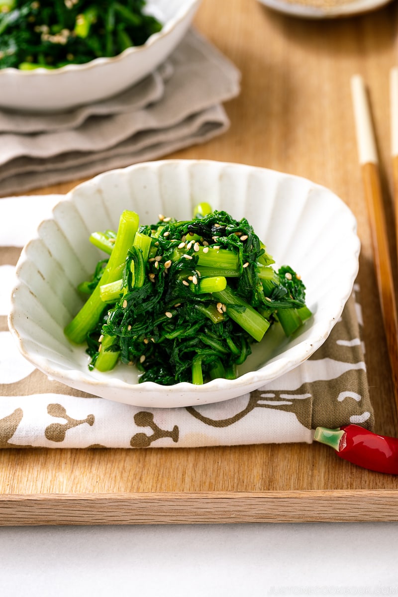 A white bowl containing Easy Chrysanthemum Salad.