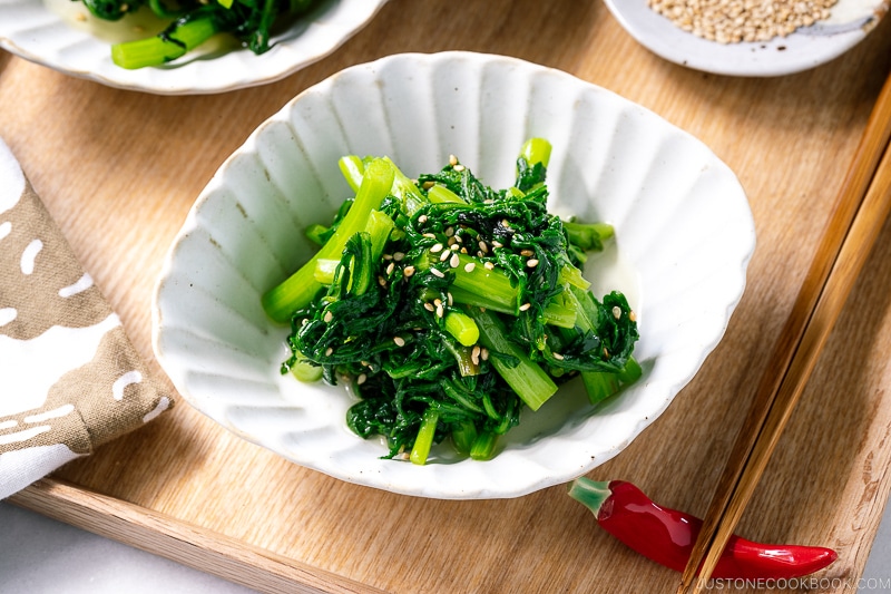 A white bowl containing Easy Chrysanthemum Salad.