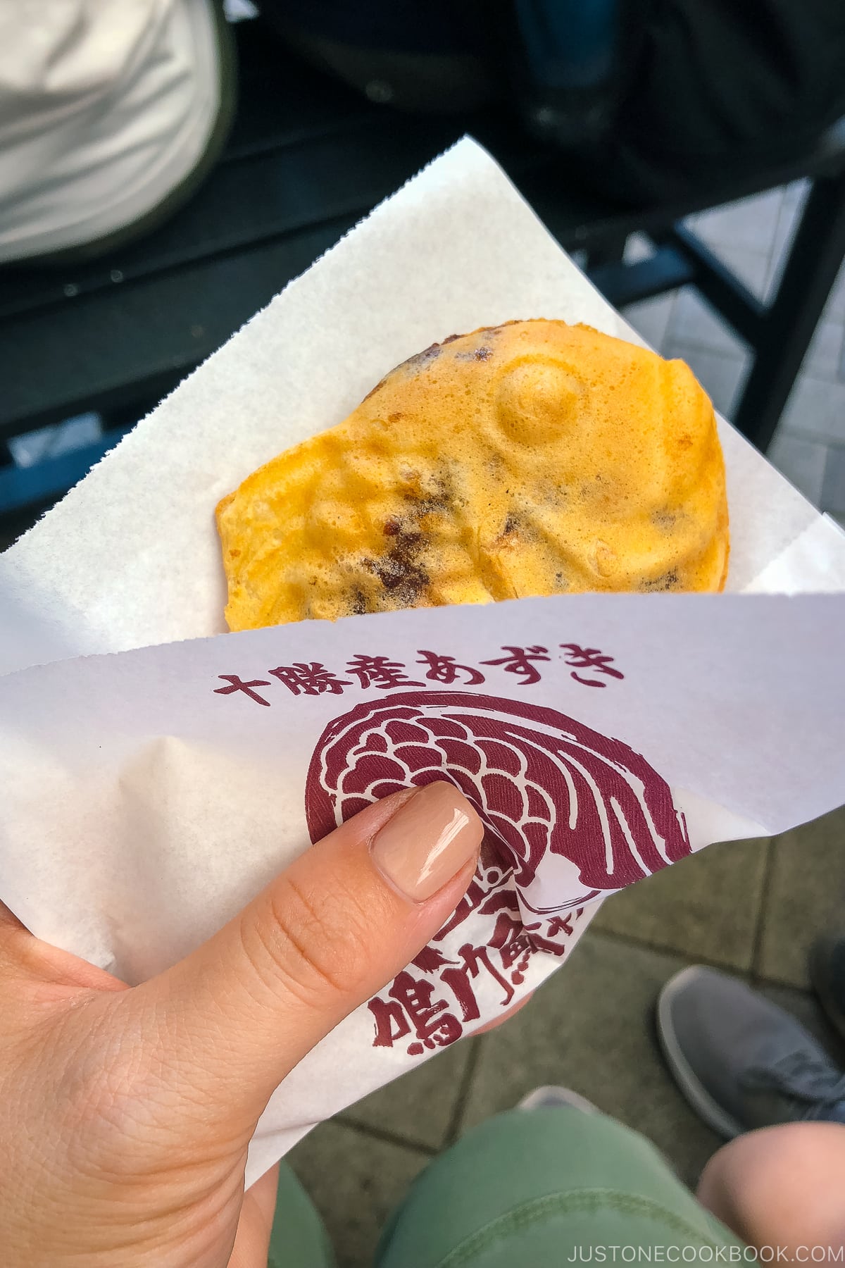 Taiyaki wrapped in a paper, from a Taiyaki shop in Tokyo, Japan.