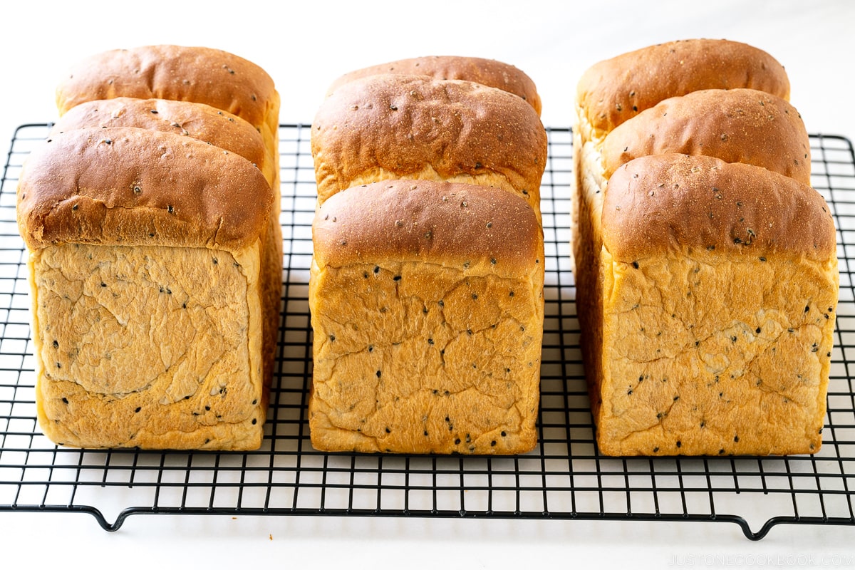 Three loaves of round-top Black Sesame Shokupan (Japanese milk bread).