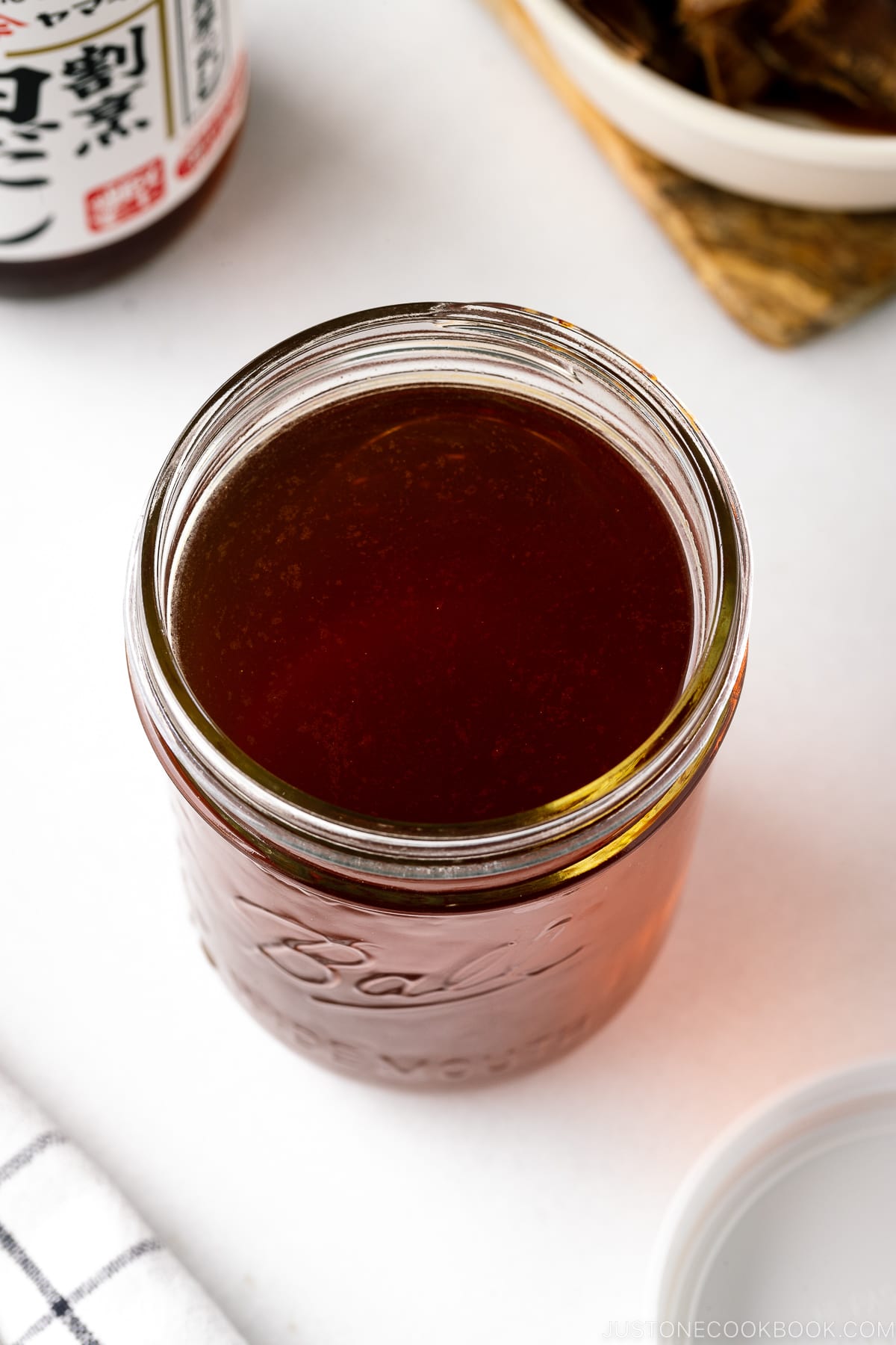 A mason jar containing Homemade Shiro Dashi (Versatile Dashi Base).