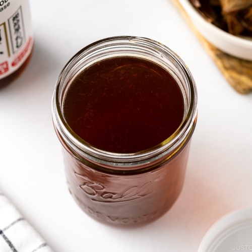 A mason jar containing Homemade Shiro Dashi (Versatile Dashi Base).