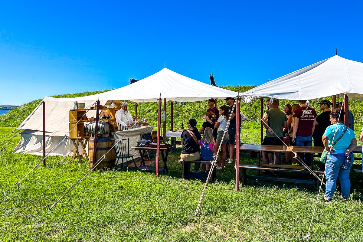 visitors under tents