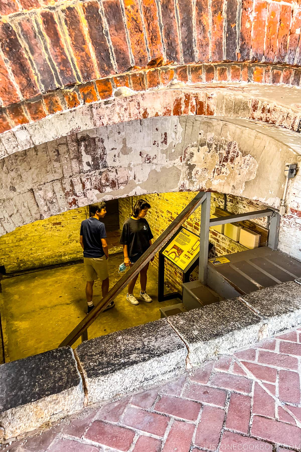 two kids in an underground room