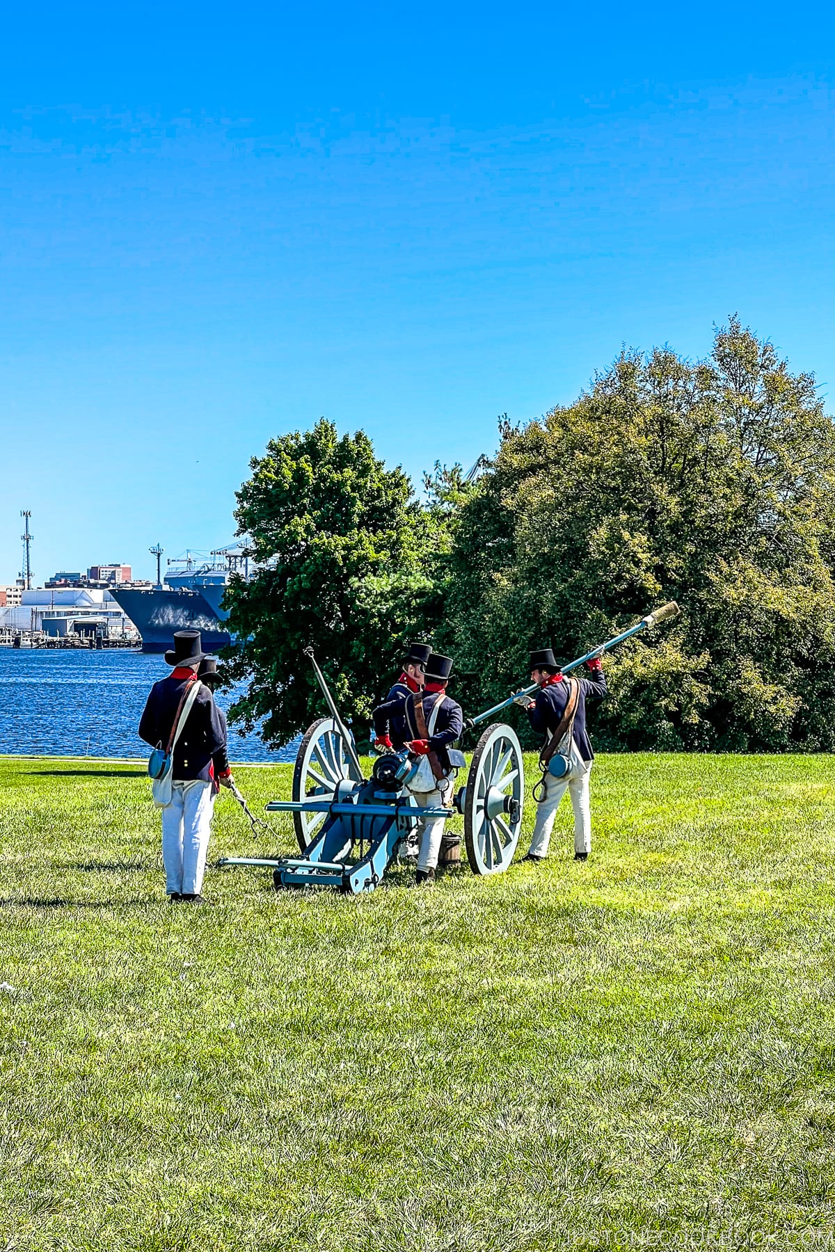 volunteers working to fire a cannon