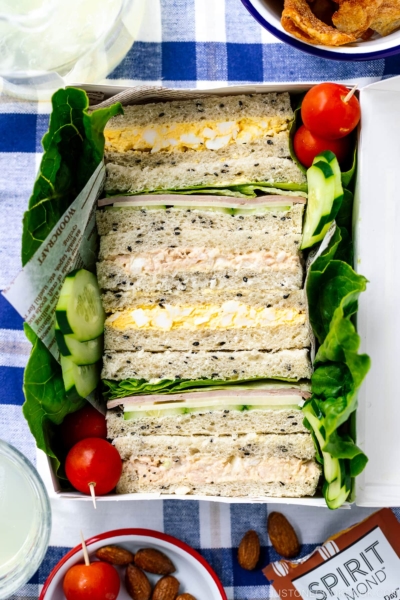 A paper box containing Japanese Sandwiches (Mixed Sando).