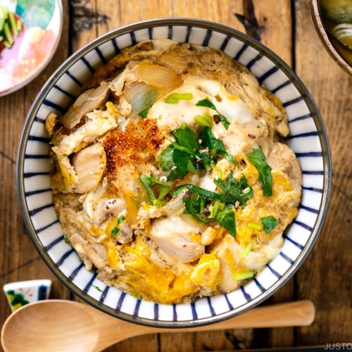 A Japanese donburi bowl containing Oyakodon, chicken and egg rice bowl.