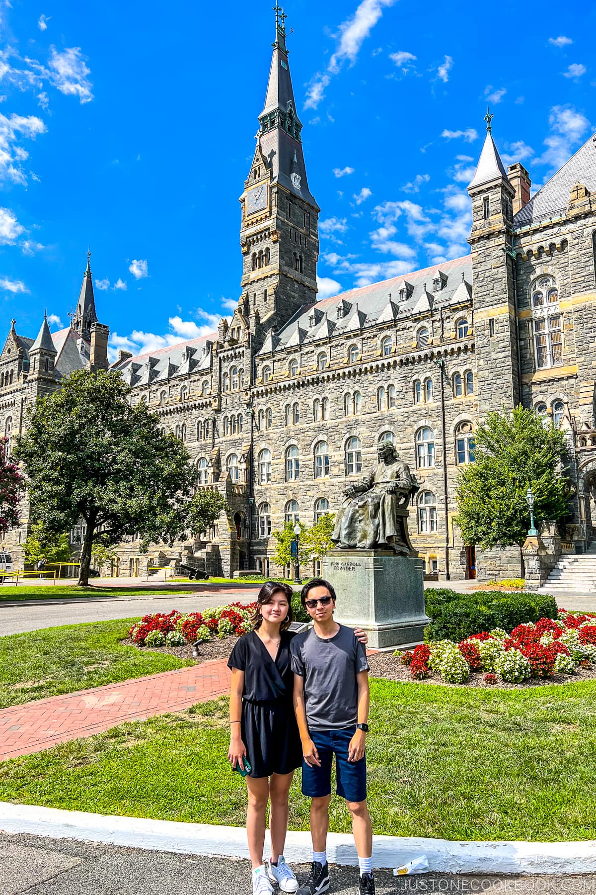 two teen standing in front of Healy Hall at Georgetown University