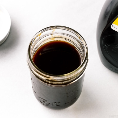 A mason jar containing homemade yakisoba sauce (copycat version of Otafuku Yakisoba Sauce).