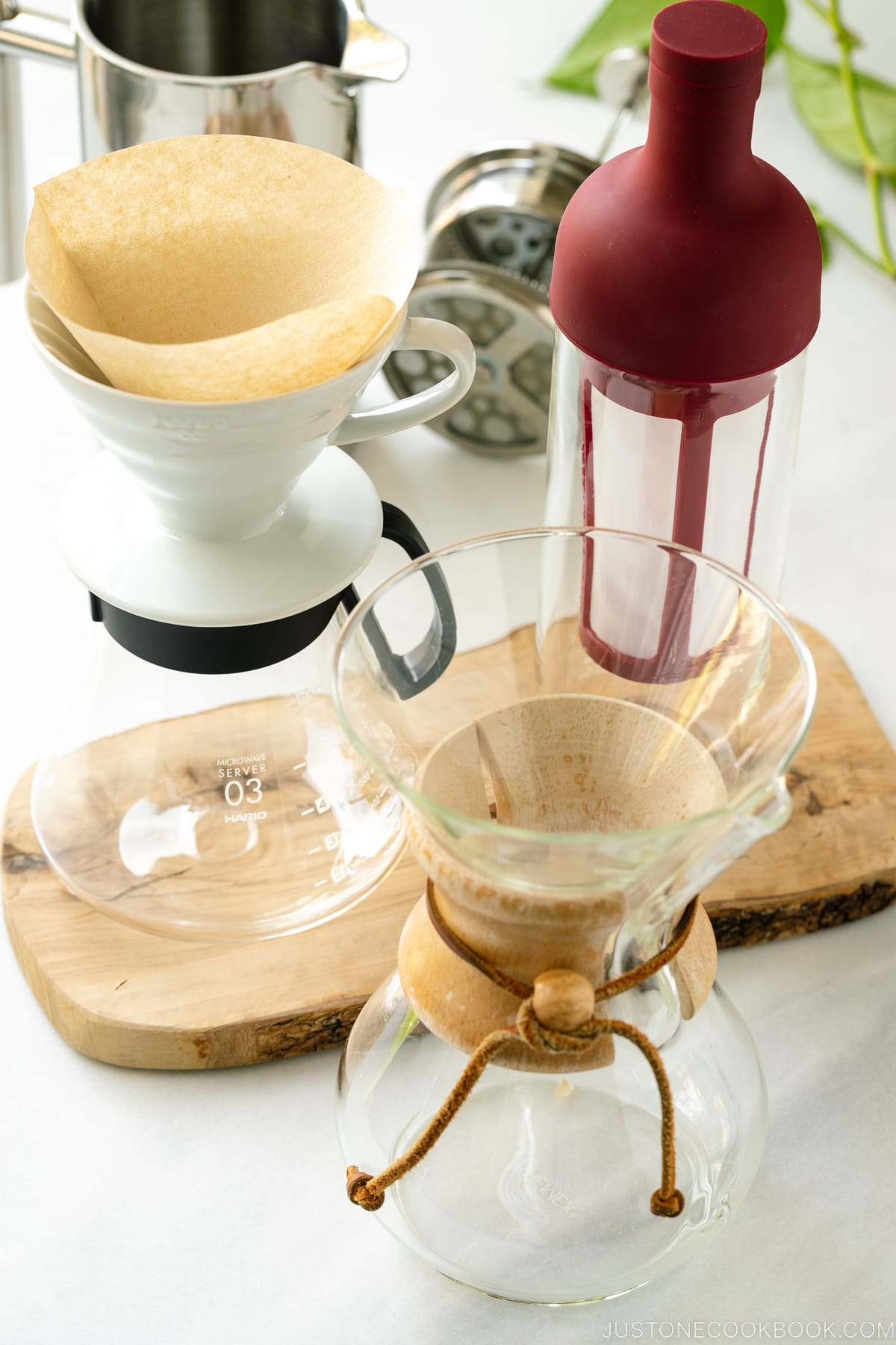 different types of coffee marker on a marble table