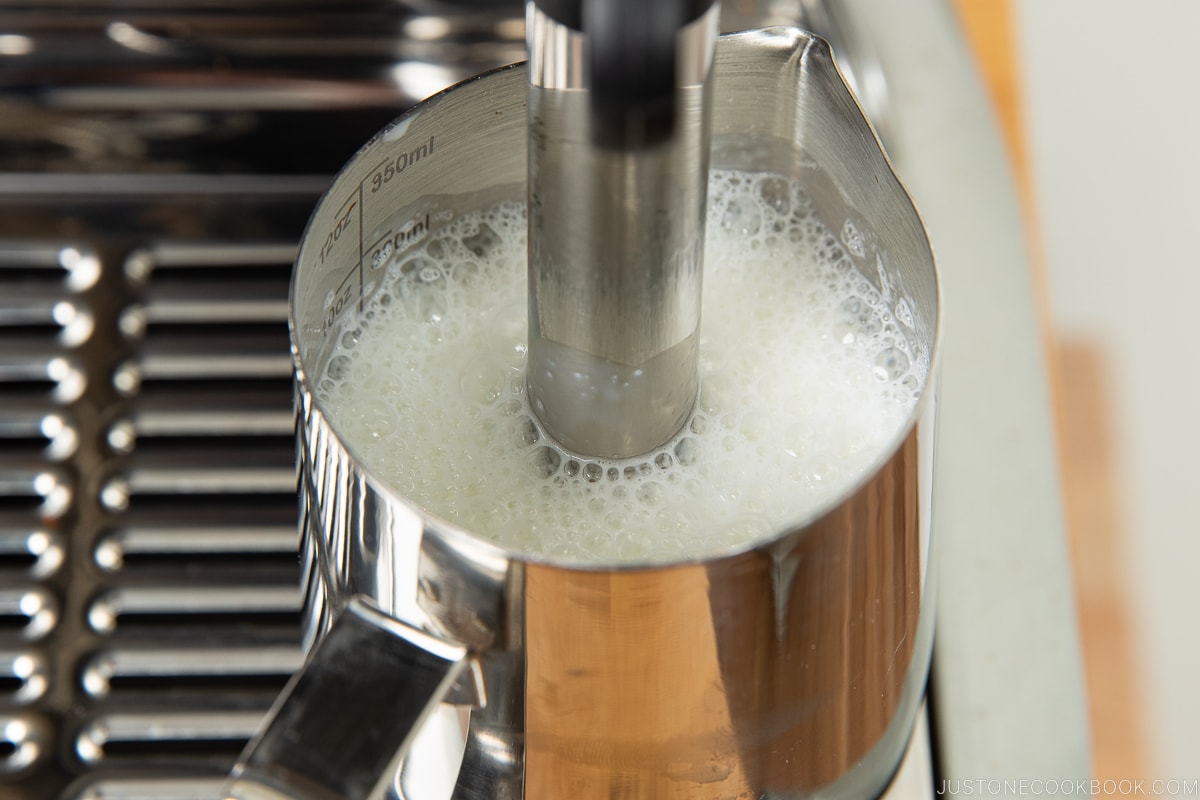 milk being frothed in a Breville Oracle Touch