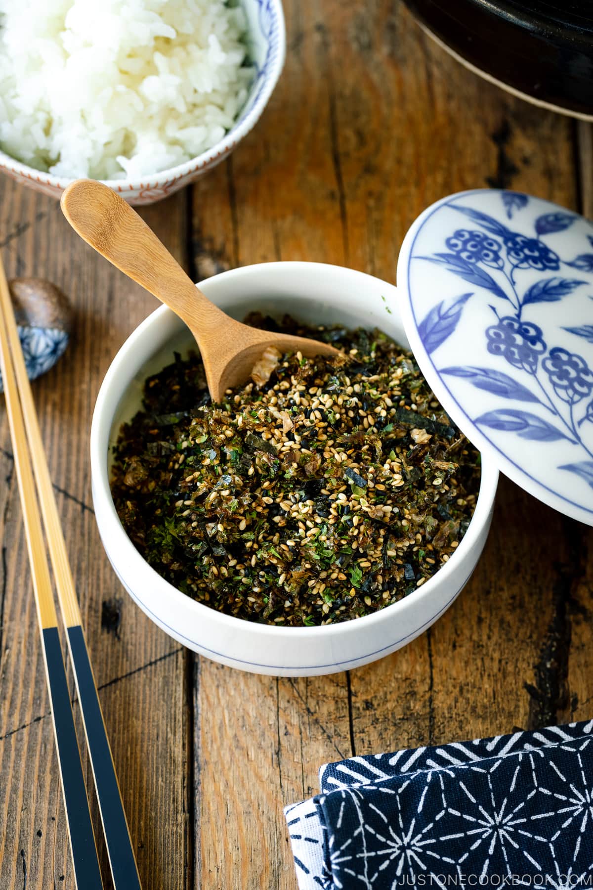 A ceramic container containing furikake.