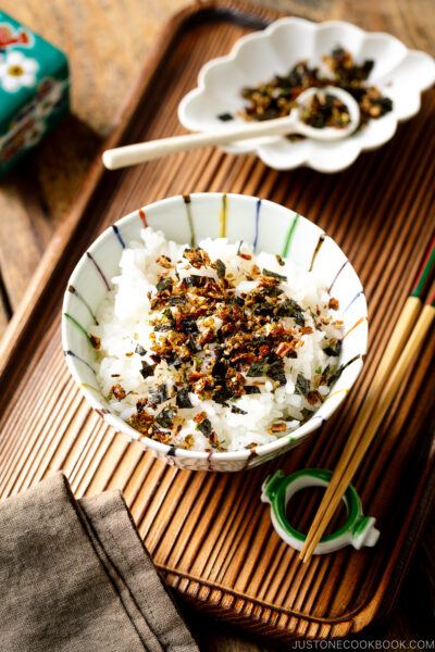 A rice bowl containing steamed rice sprinkled with furikake rice seasoning.  Gyudon (Crimson meat Bowl) Homemade Furikake Recipe 1058 II 400x600