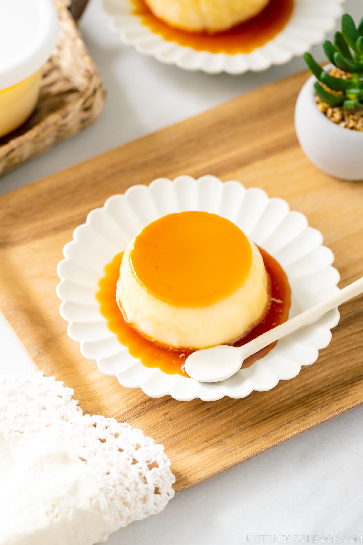 A white plate containing Purin (Japanese Custard Pudding).