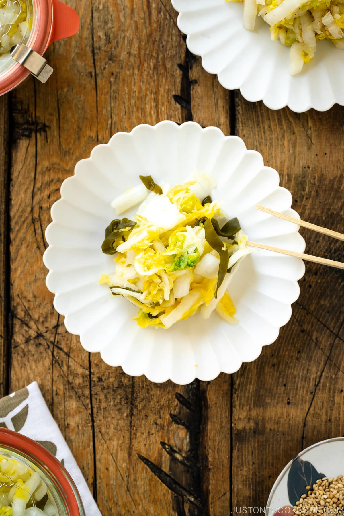 A white ceramic plate containing Napa Cabbage Pickles (Tsukemono).