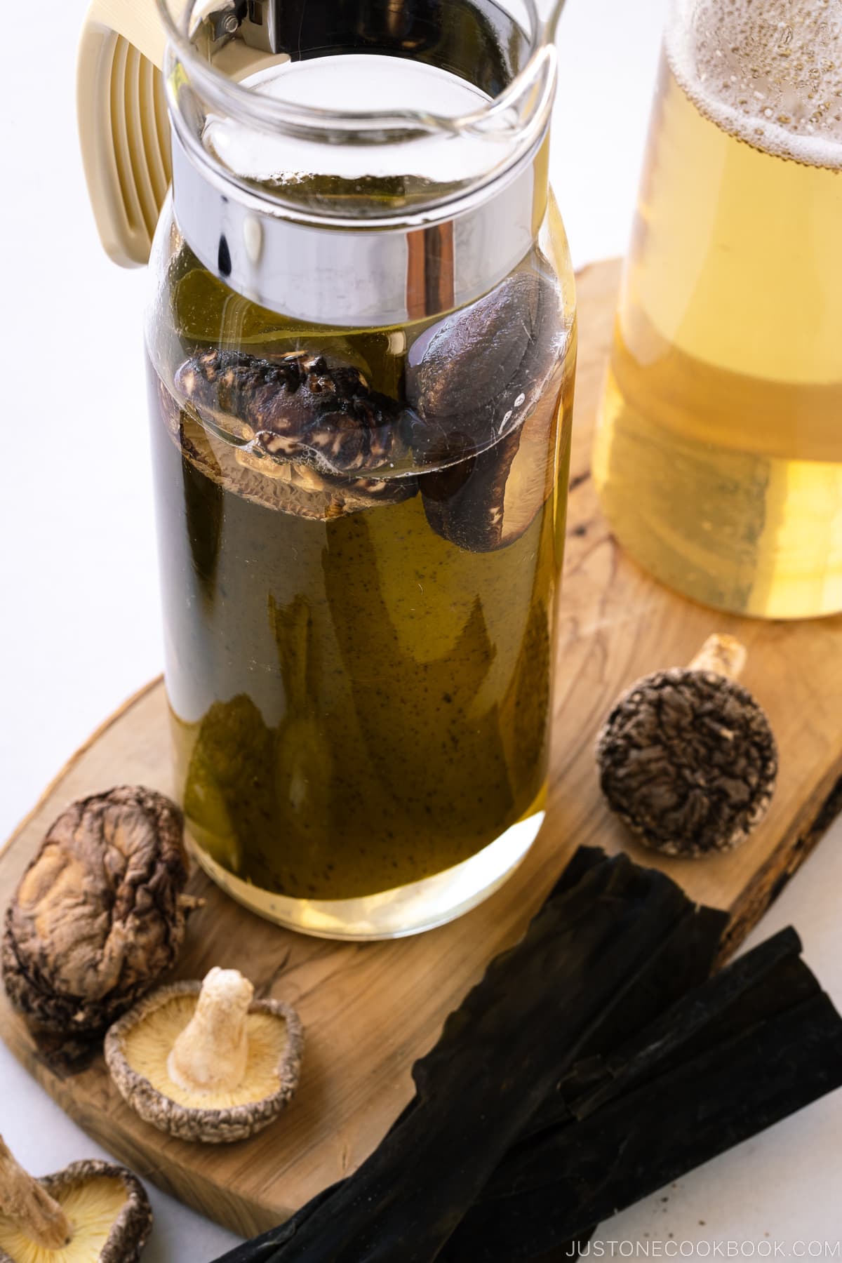 Glass pitchers containing vegan dashi (shiitake kombu dashi).