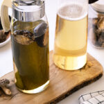 Glass pitchers containing vegan dashi (shiitake kombu dashi).