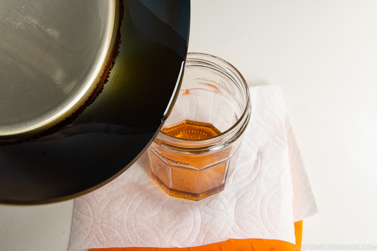 oil pour into glass jar