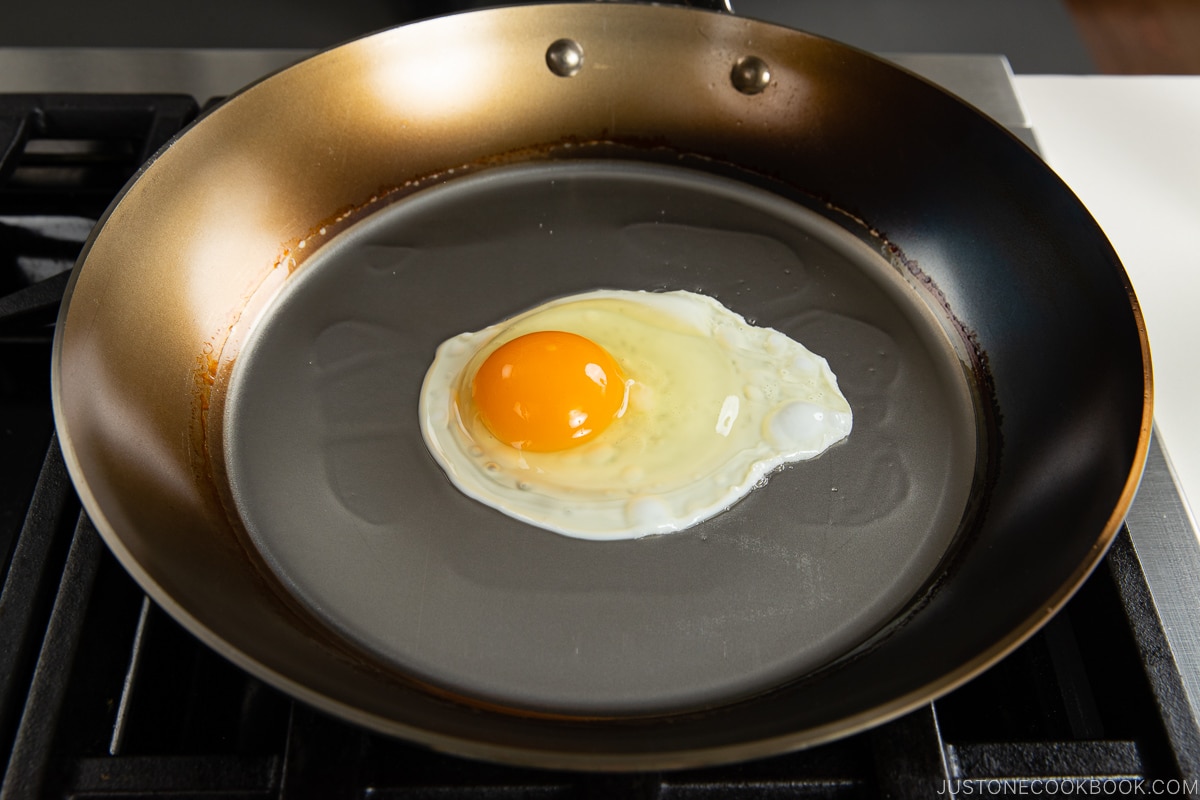 egg cooking on a fry pan